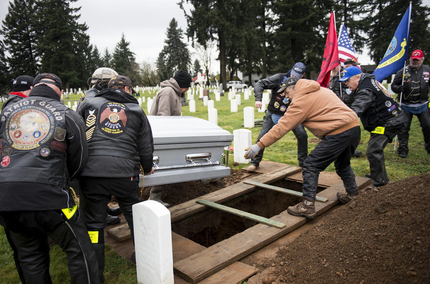 Lowering the casket